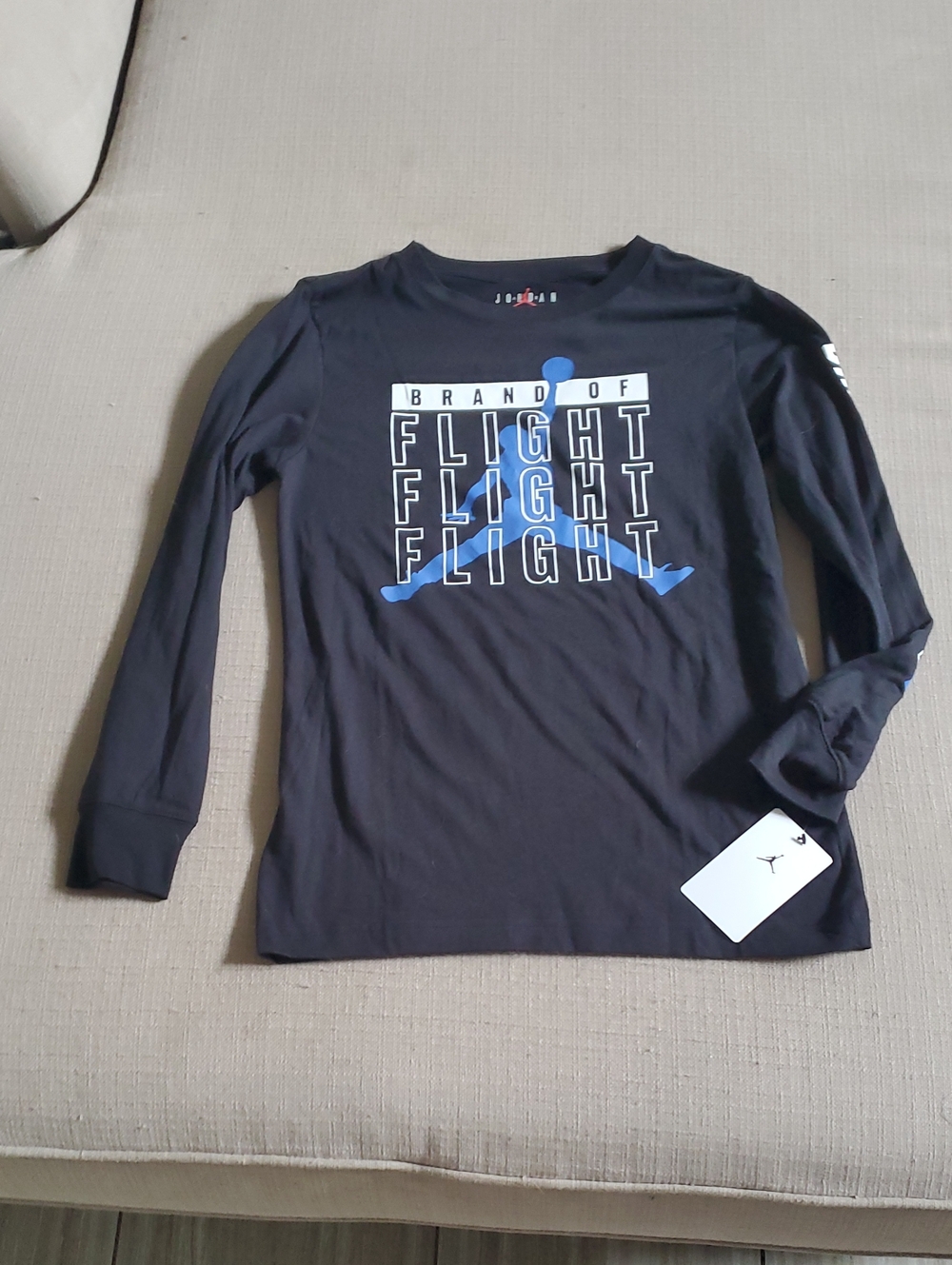 Jordan Black Long-Sleeve Tee with Blue Flight Graphic